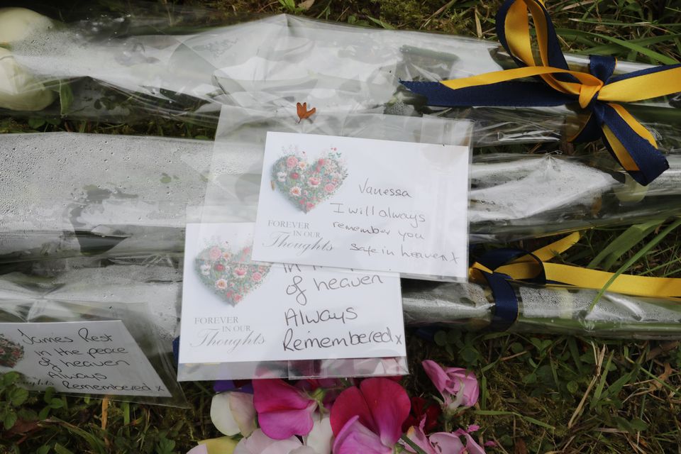 Floral tributes with  tributes left for the murdered children and mother  near the scene of Wednesday's gun attack